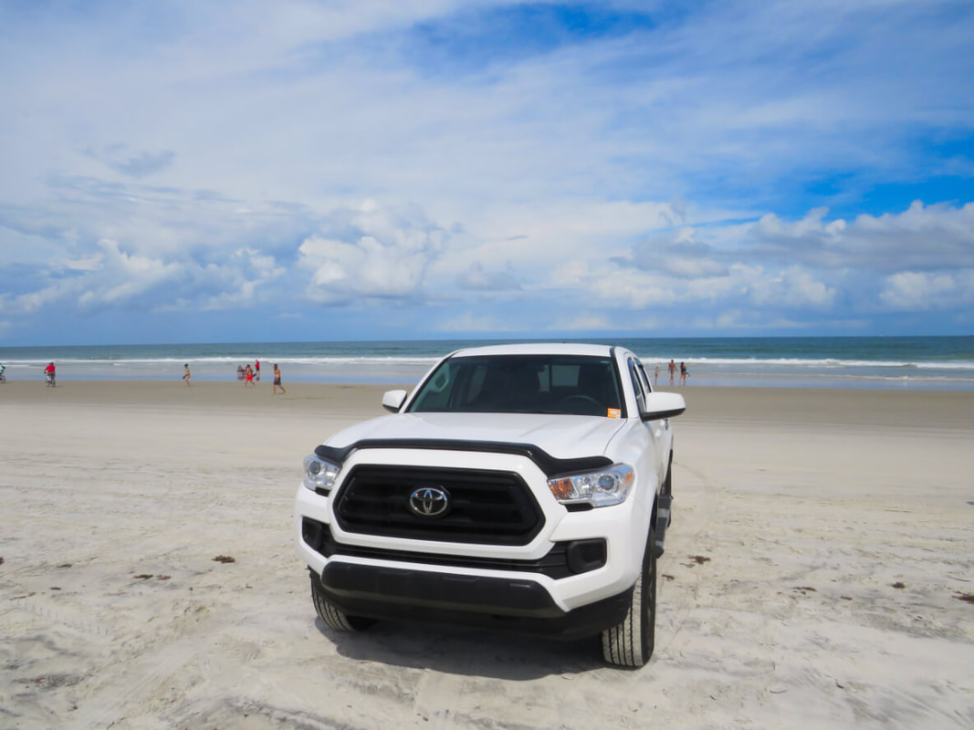 Picture of Toyota truck on beach